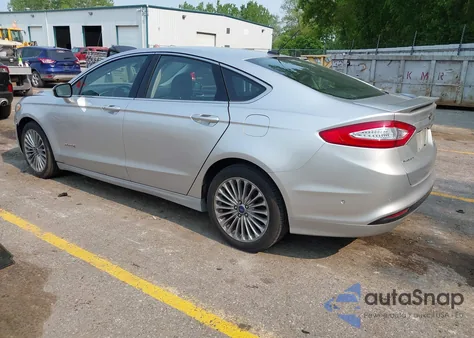 2014 Ford Fusion Hybrid Titanium z USA, uszkodzony, nr VIN 3FA6P0RU2ER211497